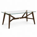 Table à manger rectangulaire en verre transparent et bois brun, détails dorés, 140 × 80 × 75 cm
